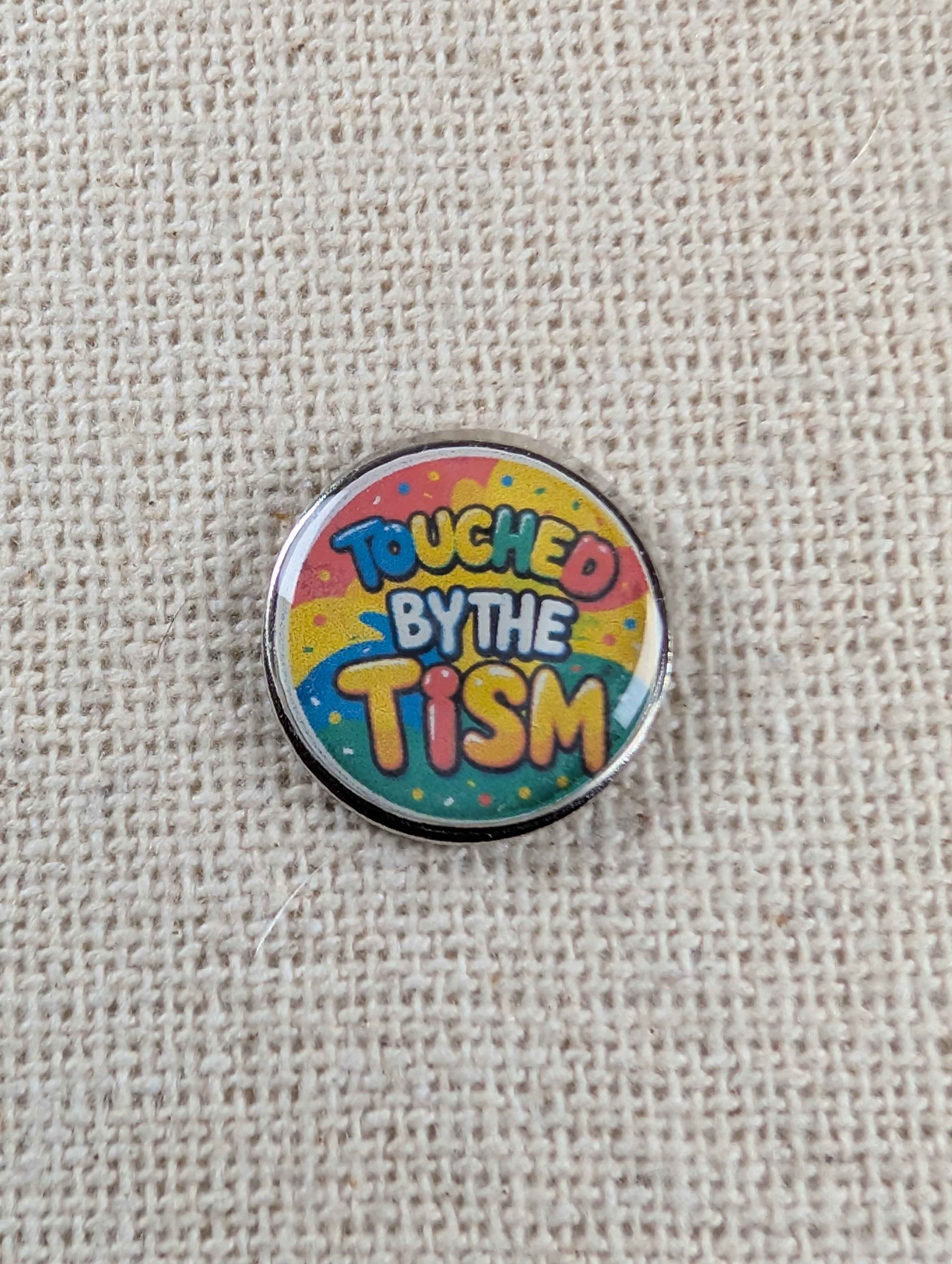 Touched by the Tism Pin Badge - Neurodiversity Resin Pin - Large Lapel Badge